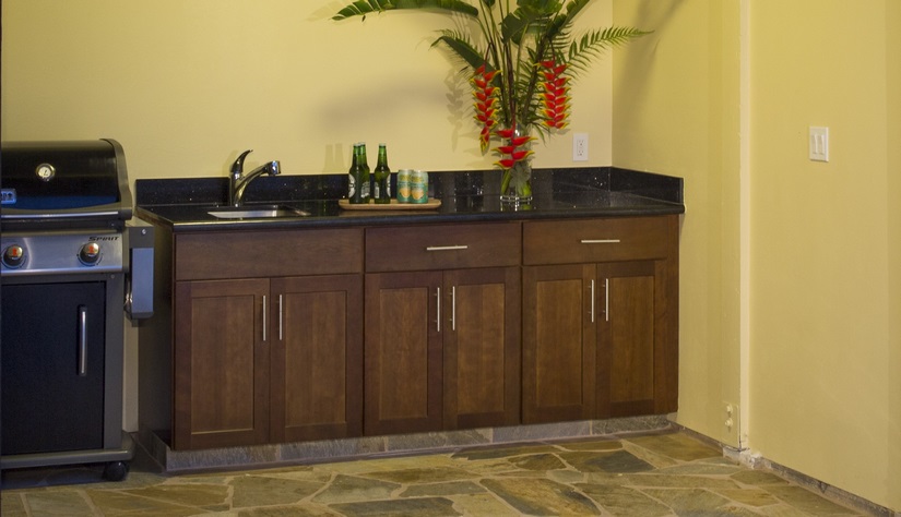 Cabinets in the gazebo set on a raised platform to prevent water damage.