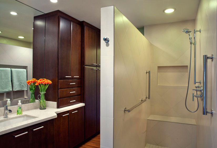 Bathroom remodel eschews traditional depths to create more space for the walk-in shower.