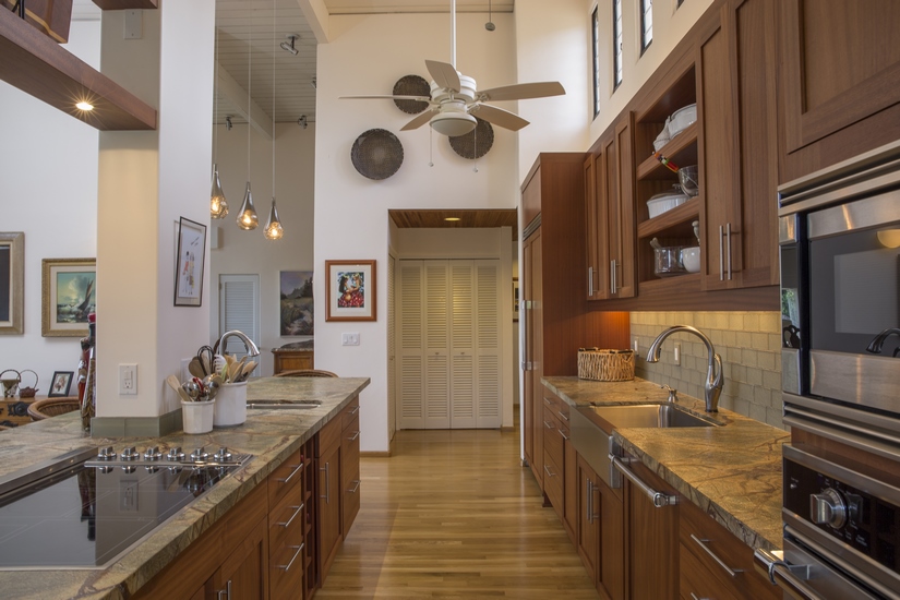 The homeowners kept the existing oak wood flooring by sanding it down and adding a new finish.