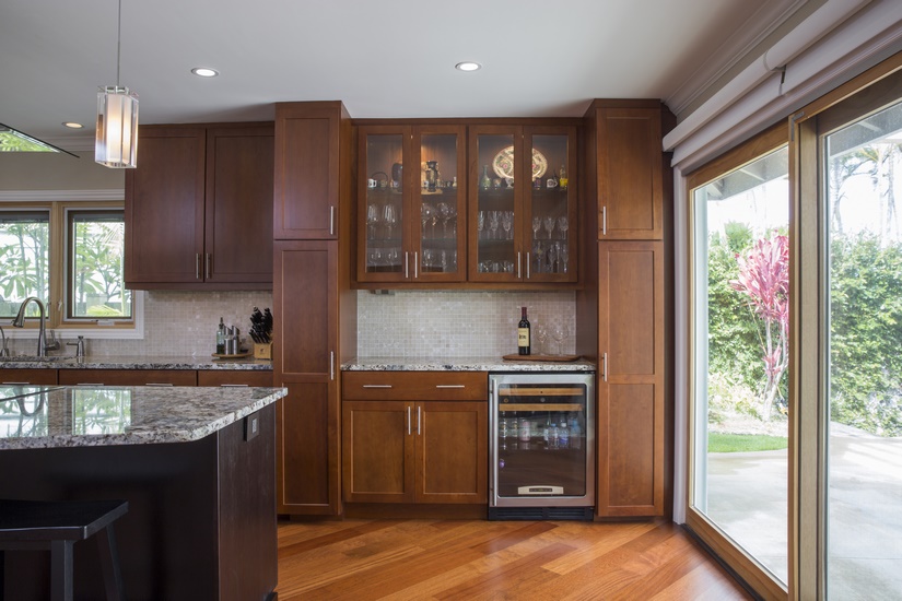 The kitchen remodel enlarged the view of the waterfront and incorporated a buffet area.